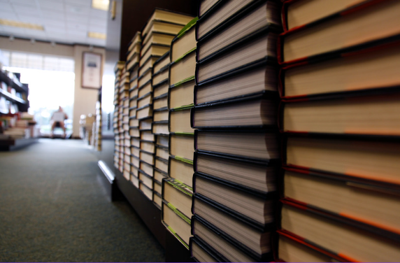 Close-up of books on a bookstore display table
